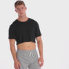 A WHITE WALL VIDEO OF A MALE MODEL WEARING THE SAMMY SHOP UNISEX BLACK MINI CROP T-SHIRT