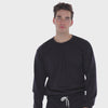 A WHITE WALL VIDEO OF A MALE MODEL WEARING THE SAMMY SHOP UNISEX BLACK EVERYDAY CREW SWEATSHIRT