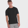 A WHITE WALL VIDEO OF A MALE MODEL WEARING THE SAMMY SHOP UNISEX BLACK EVERYDAY T-SHIRT