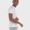 A WHITE WALL VIDEO OF A MALE MODEL WEARING A SAMMY SHOP UNISEX WHITE EVERYDAY T-SHIRT